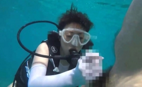 Seductive Japanese Beauty Gives A Nice Handjob Under Water