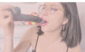 Babe Sucks And Spits On A Dildo