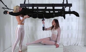 Femdom vixens punishing cock and balls in BDSM threesome