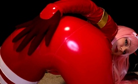 Femdom MILF vixen in red latex bodysuit plays with herself